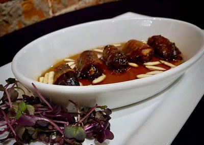 Devils on Horseback appetizer with maple bourbon glaze