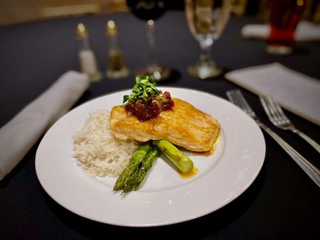 Seared salmon entree at The Empire Bistro